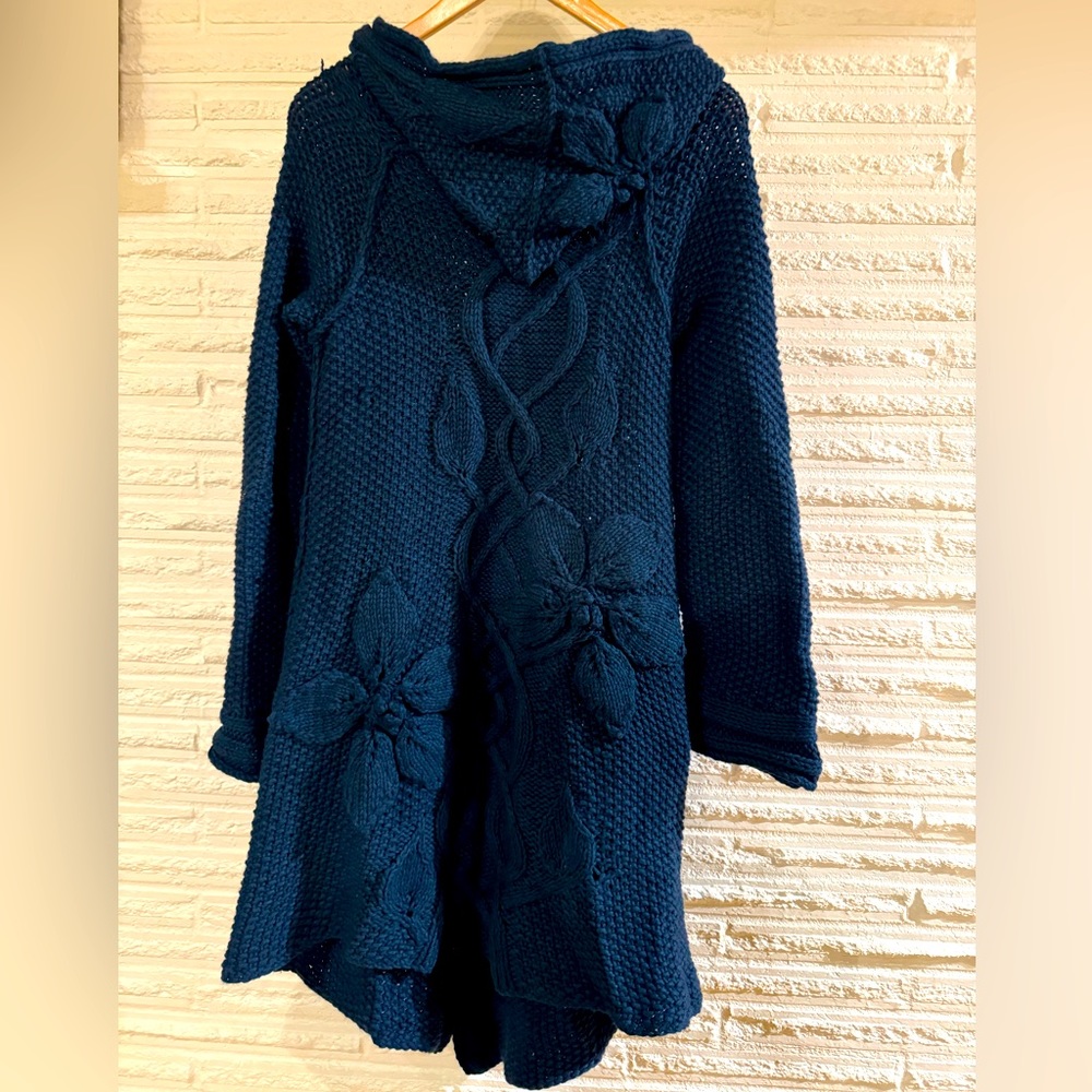 Hand knitted long cabled flower sweater coat in rich teal green